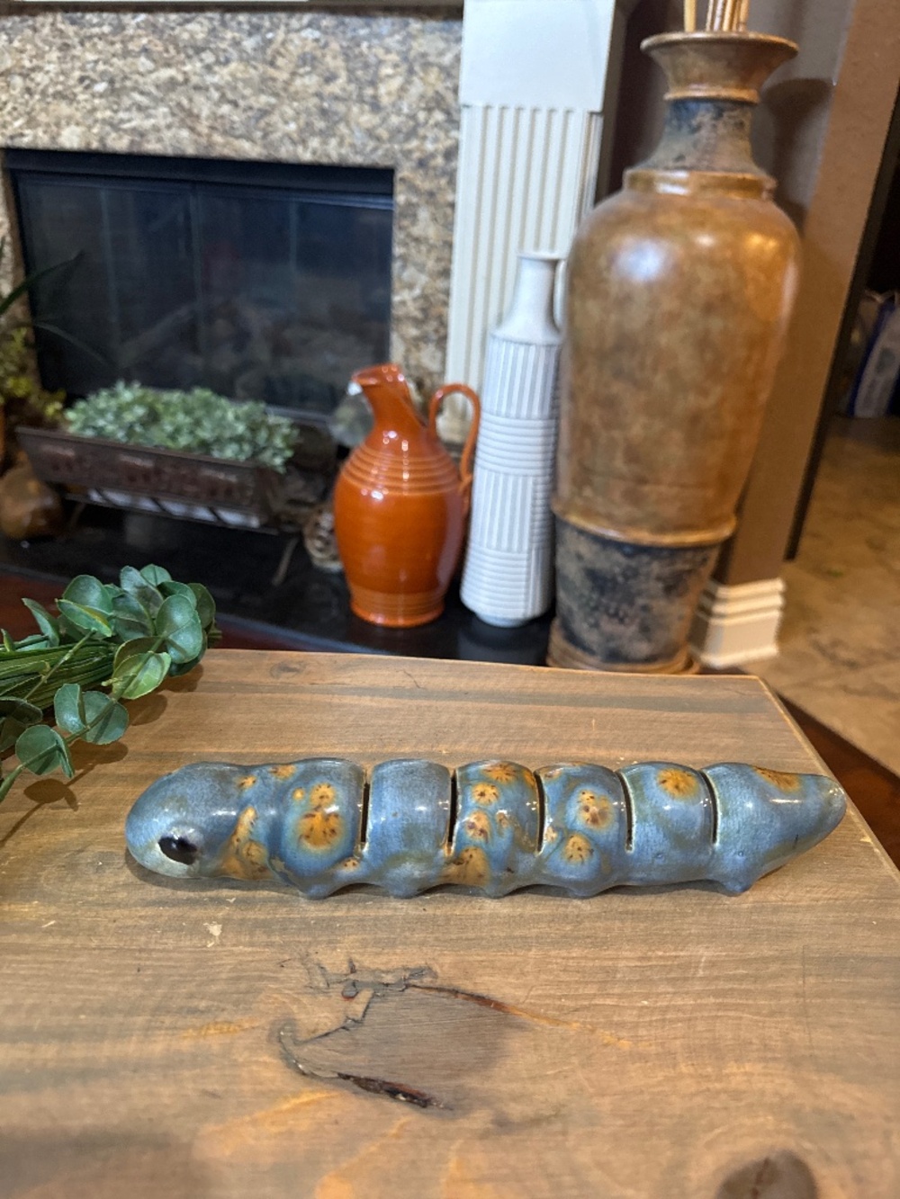Signed Tony Clennell handmade glazed ceramic caterpillar art piece holder.